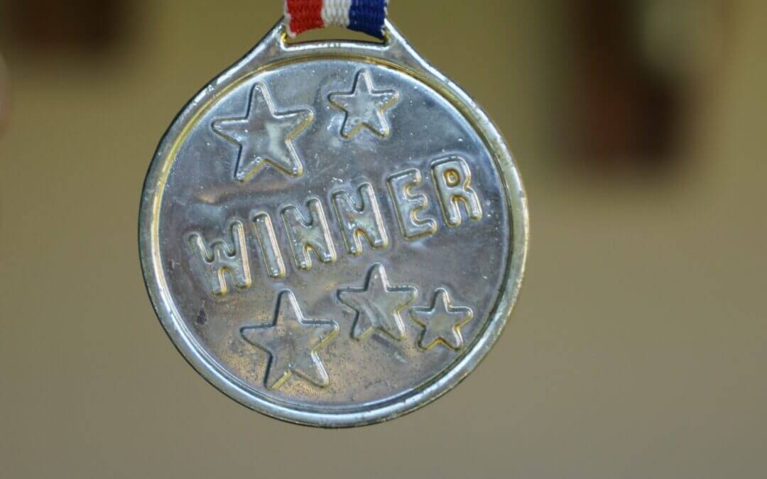 Medalj med texten "winner"